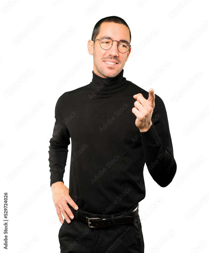 Happy young man pointing at you with his finger Happy young man pointing at you with his finger