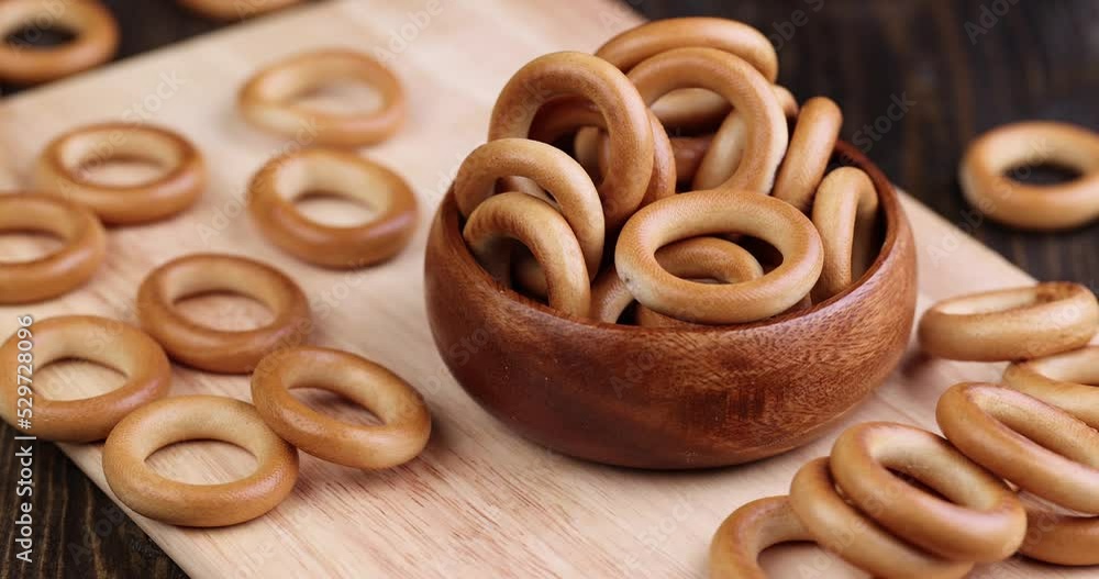 a solid bagel is moving on the table, delicious traditional Russian food round bagels for tea a solid bagel is moving on the table, delicious traditional Russian food round bagels for tea