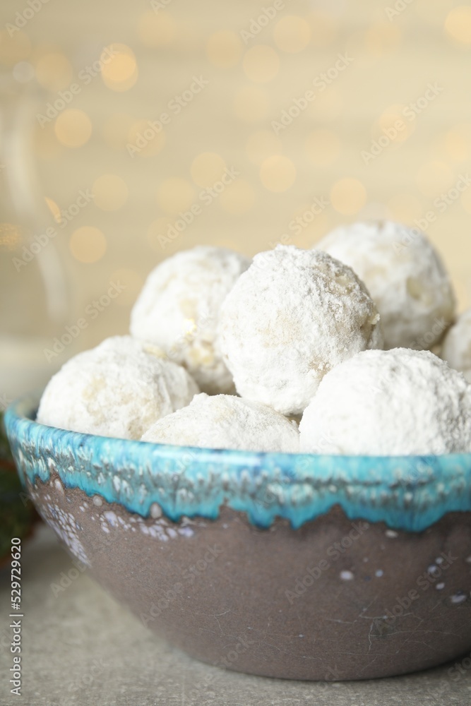 Tasty snowball cookies in bowl, closeup. Christmas treat Tasty snowball cookies in bowl, closeup. Christmas treat