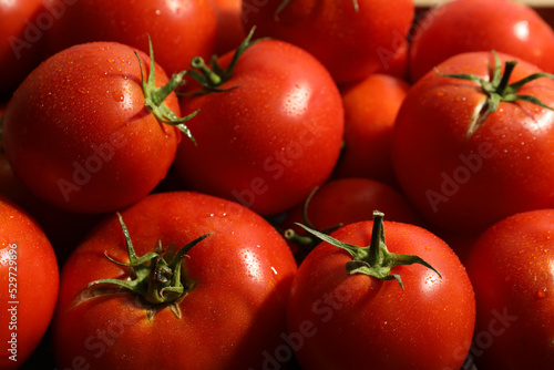 Fresh ripe red tomatoes as background, closeup © New Africa
