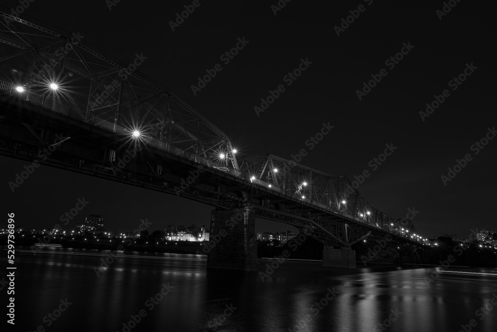 Steel bridge over a river at night Steel bridge over a river at night