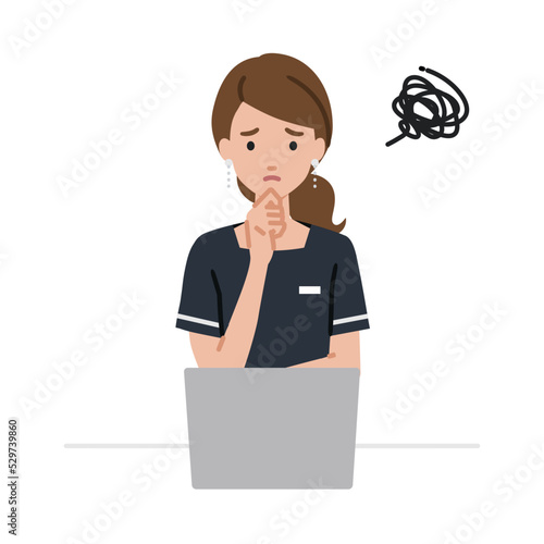 デスクで座ってPCを開いて困っているエステ店員・受付・接客係の女性