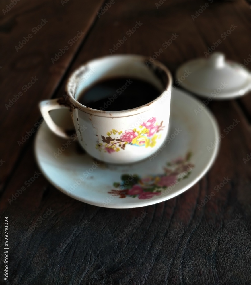 cup of coffee on black background cup of coffee on black background