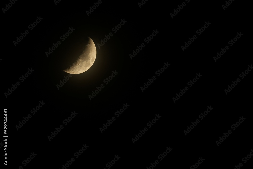 half moon at night in the dark sky half moon at night in the dark sky