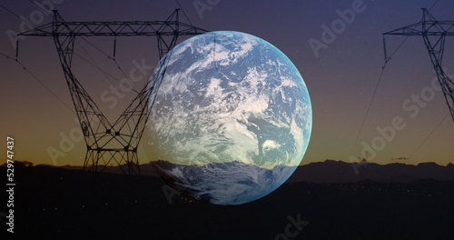 Image of spinning globe over electricity pylon