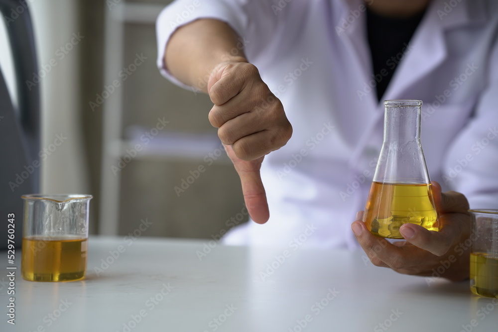 Oil pouring, Equipment and science experiments, Formulating the chemical for medicine, Organic pharmaceutical, Alternative medicine concept. (Selective Focus) Oil pouring, Equipment and science experiments, Formulating the chemical for medicine, Organic pharmaceutical, Alternative medicine concept. (Selective Focus)
