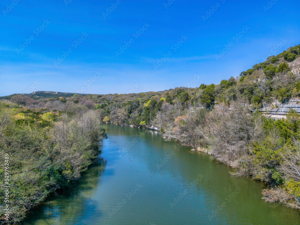 Aerial view of Colorado River against the blue sky at Austin, Texas