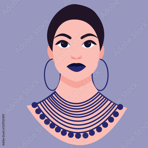 Portrait of a beautiful  American woman with blue jewelry and lipstick.