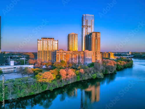 Austin, Texas- Colorado River with a reflection of the buildings with sunset glow
