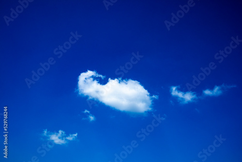 Air clouds in the blue sky background