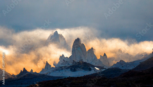 Monte fitz roy stunning snowy mountain cloudy sky © AloneArt