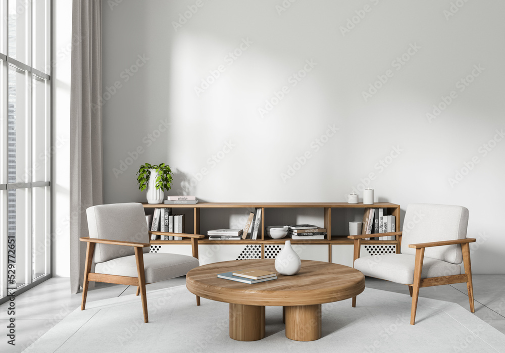 Fototapeta premium Light living room interior with chairs and decoration. Mockup empty wall