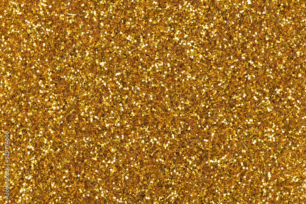 Elegant gold glitter texture, background with attractive shiny surface for design. Sparkling shiny wrapping paper, New Year holiday seasonal wallpaper decoration greeting winter Christmas artwork xmas