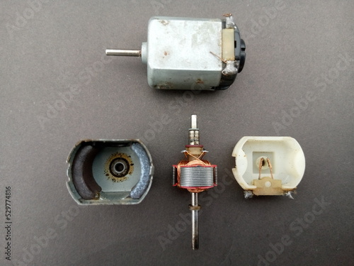 parts of dc motor, armature, brushes, permanent magnets and commutator photo