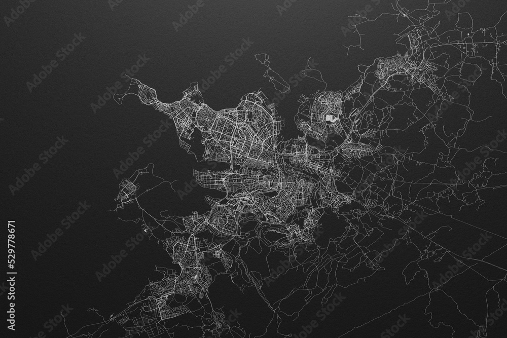 Street map of Reykjavik (Iceland) on black paper with light coming from top