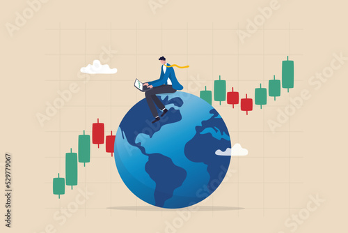 Global stock market, world or international investment, financial analysis or earning growth, stock trading concept, smart businessman investor trading on laptop on the globe with financial graph.