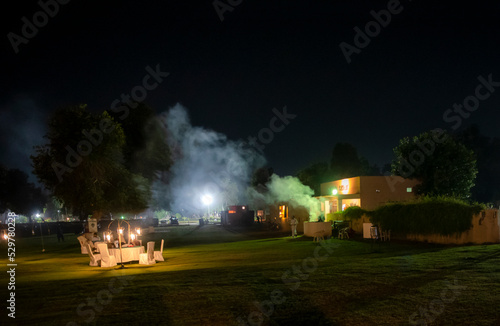 smoke in the building with colorful lights  © Tariq