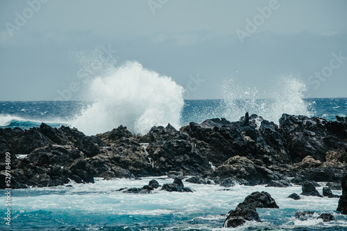 waves crashing on rocks