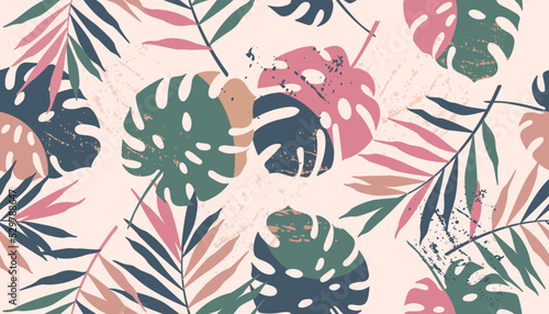 Seamless tropical abstract pattern with palm and monstera leaves in scandinav...