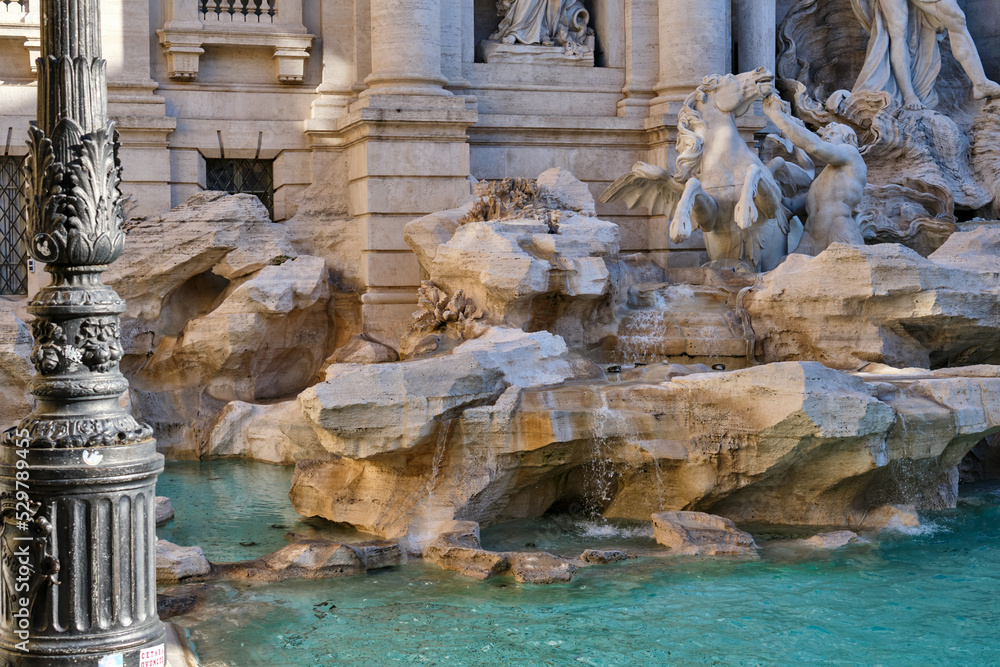 A detail view of the Trevi Fountain in the morning - no people. Tourist attraction in Rome.