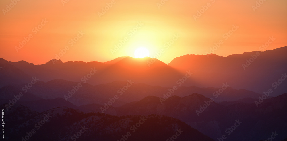 Mountain Silhouettes at Sunset