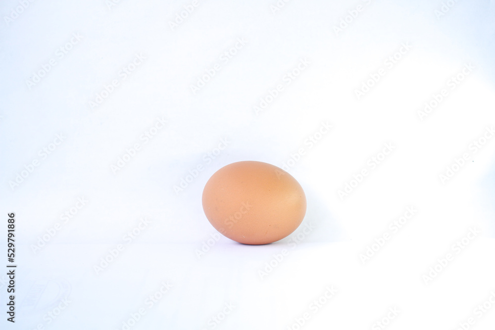 One chicken egg. Isolated on white background One chicken egg. Isolated on white background