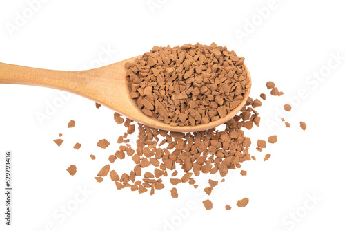 Wooden spoon with granulated coffee isolated white background close up. instant coffee