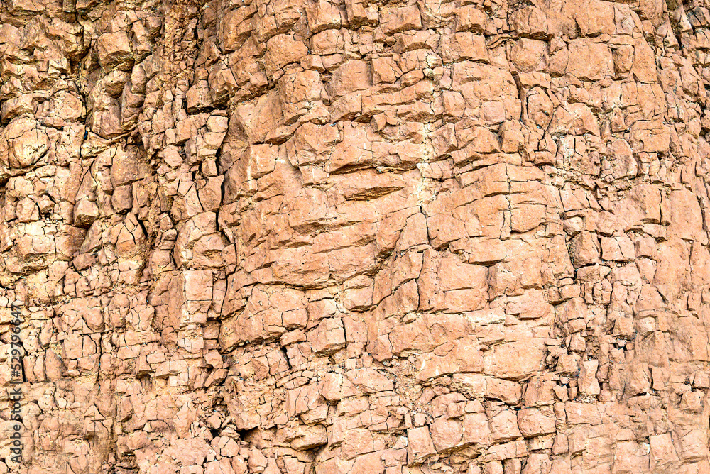 Mountain cracked earth wall background. texture, nature Mountain cracked earth wall background. texture, nature
