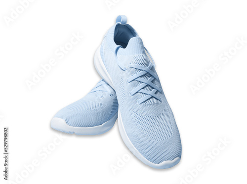 Blue pastel color sneakers on background