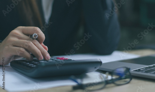 Business woman working on Desk office in finance and accounting Analyze financial budget in the office