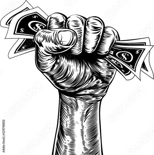 Fist holding money concept
