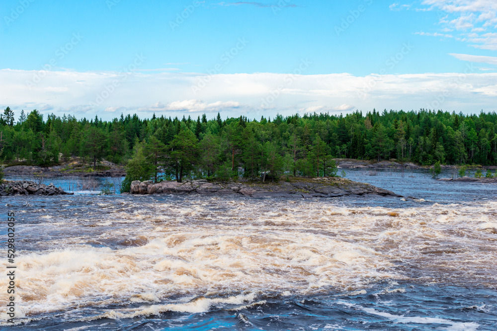 Powerful stormy mountain river in the wild Taiga