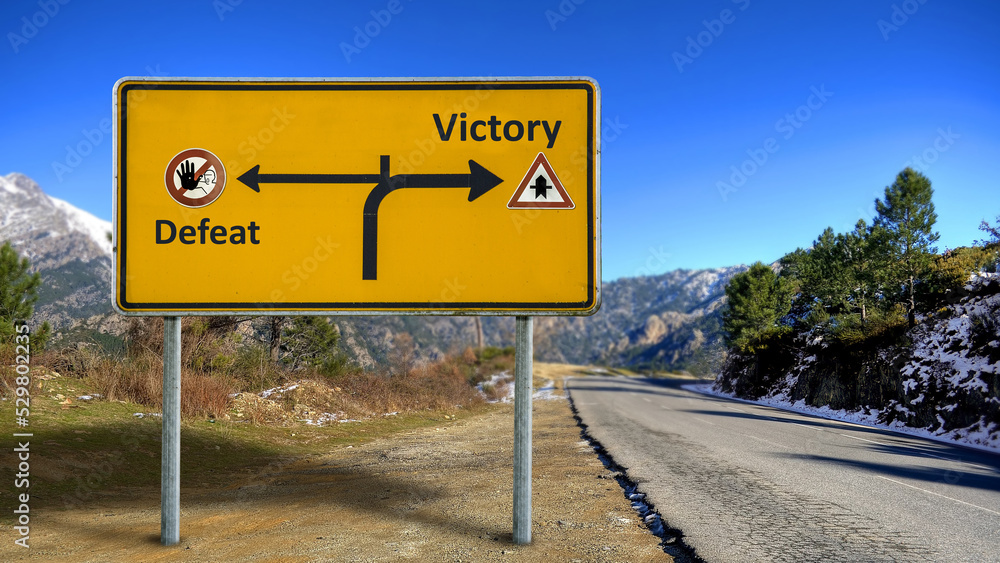 Street Sign Victory versus Defeat