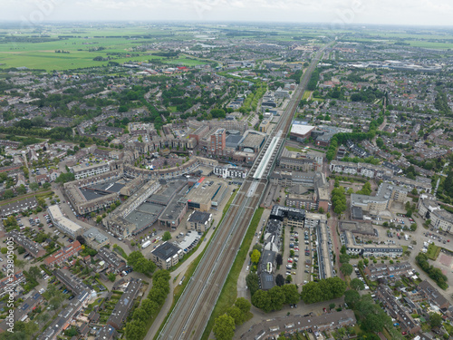 Houten is a city and municipality in the Dutch province of Utrecht. Located southeast of the city of Utrecht between the highways A12 , A27 and the river Lek. Central station and urban city center © Sepia100