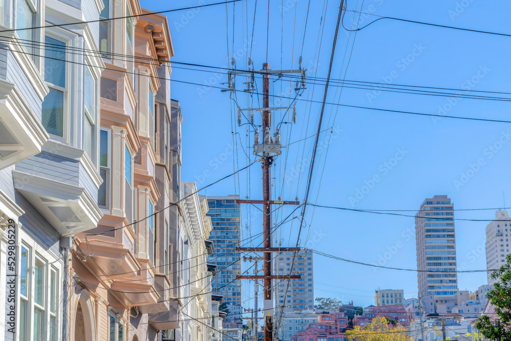 Intersecting electrical wires and electric posts in an urban area at San Francisco, CA Intersecting electrical wires and electric posts in an urban area at San Francisco, CA
