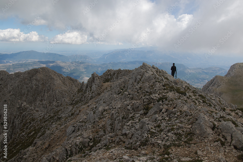 Panoramic view of the crest of Sirente  massif in Abruzzo during cloudy day of summer