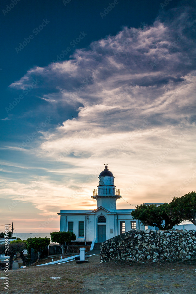beautiful sunrise view of the Cihou Lighthouse in Kaohsiung, Taiwan.