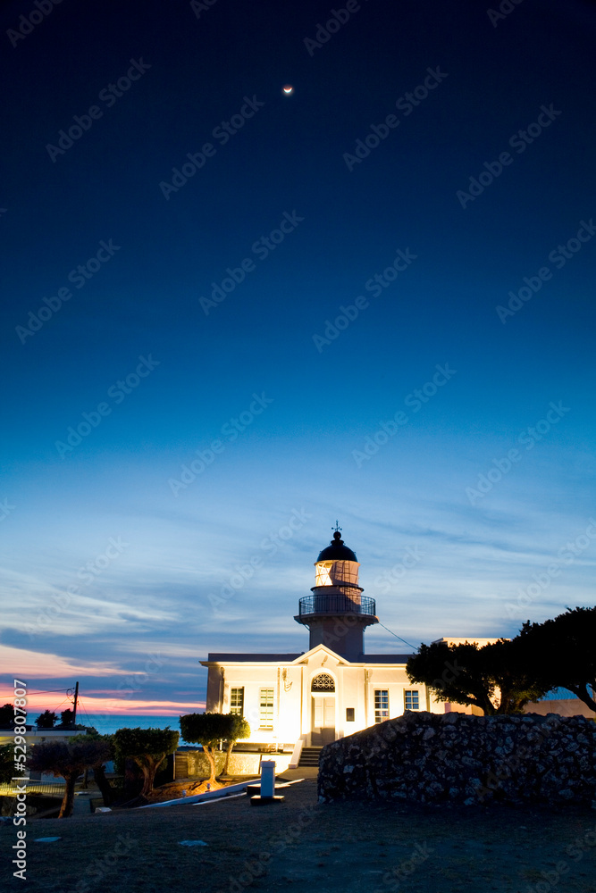 beautiful sunset view of the Cihou Lighthouse in Kaohsiung, Taiwan.