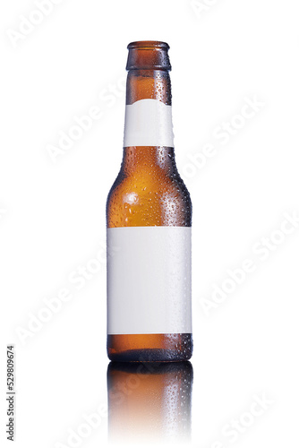 Cold Beer bottle with condensation drops and white labels and a semitransparent reflection
