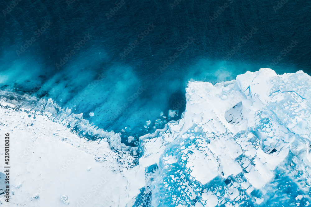 Iceland. An aerial view of an iceberg. Winter landscape from a drone. Jokulsarlon Iceberg Lagoon. Vatnajokull National Park, Iceland. Traveling along the Golden Ring in Iceland.