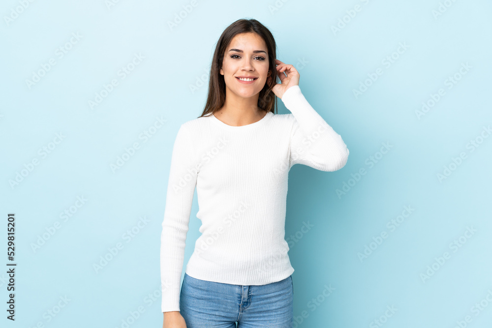 Young caucasian woman isolated on blue background laughing Young caucasian woman isolated on blue background laughing