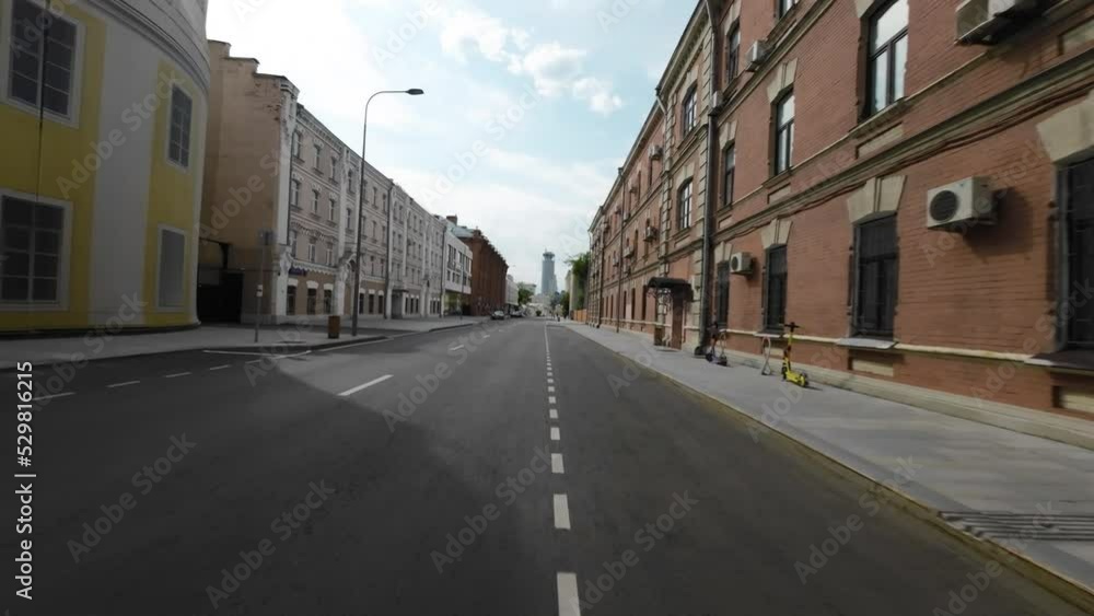 Across the city street. 4k slow motion video footage with wide angle lens Across the city street. 4k slow motion video footage with wide angle lens