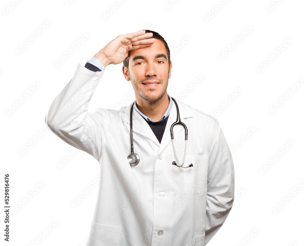Surprised doctor with search gesture against white background Surprised doctor with search gesture against white background