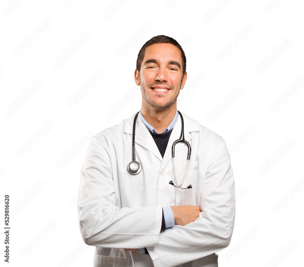 Confident doctor against white background