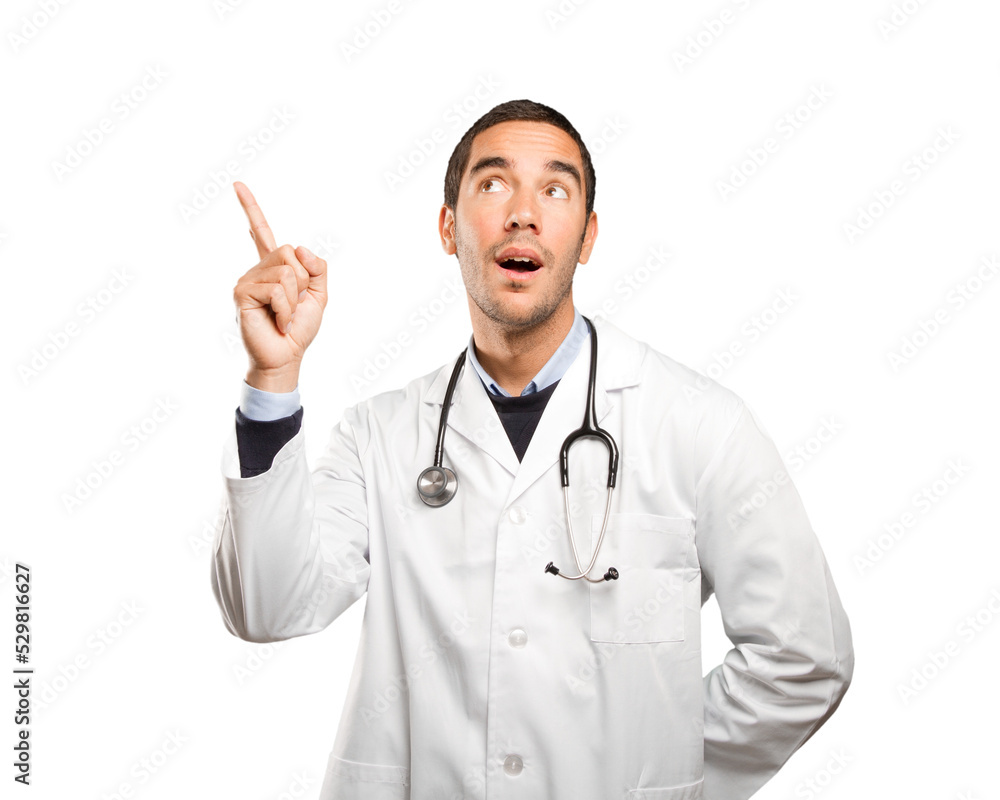 Surprised doctor pointing up Surprised doctor pointing up