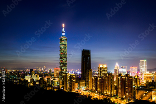 Night view of Taipei s modern buildings from the top of the Xiangshan mountain in Taipei  Taiwan.