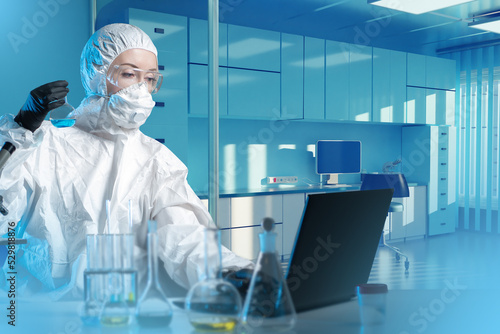 Woman Chemist. Working with...