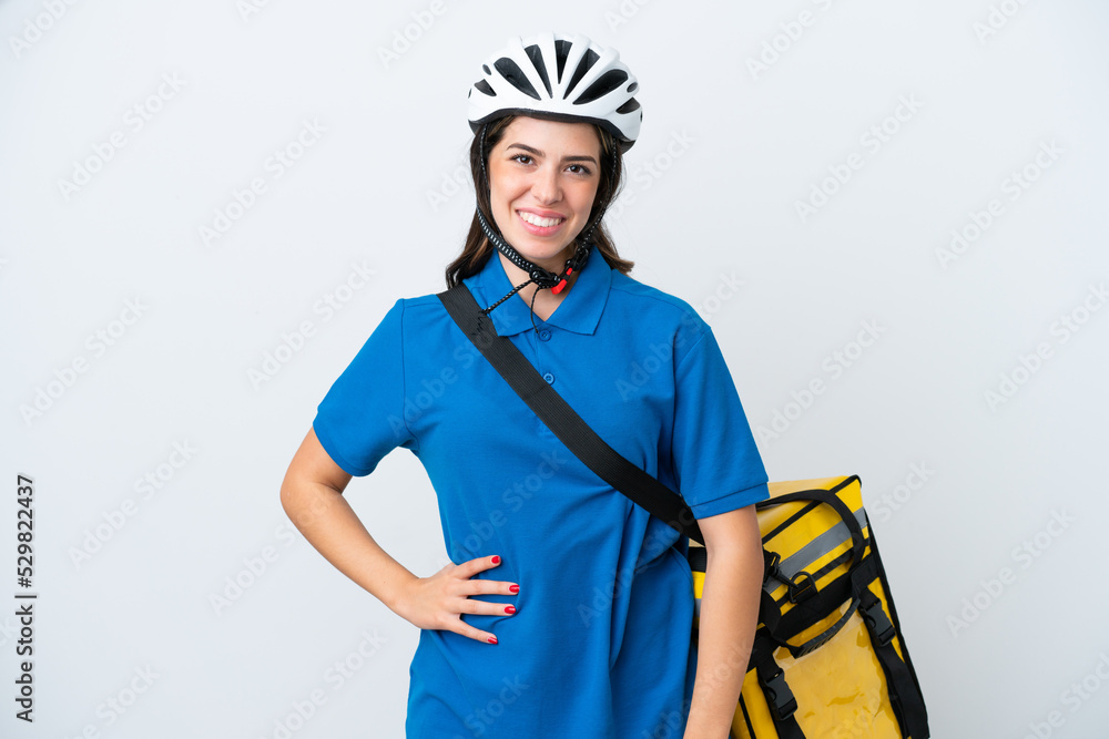 Young delivery woman with thermal backpack isolated on white background laughing Young delivery woman with thermal backpack isolated on white background laughing