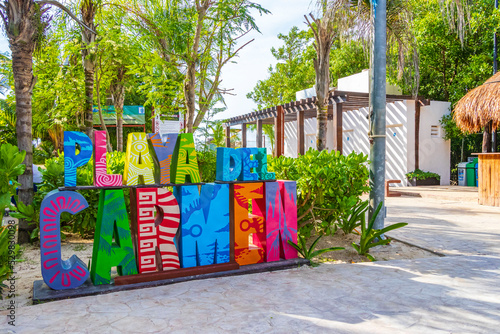 Colorful Playa del Carmen lettering sign symbol on beach Mexico.