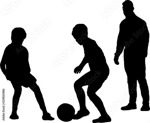 Two boys in soccer practice